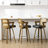 Zelen Swivel Counter Stool in Black Rebo Leather with Rattan Backrest